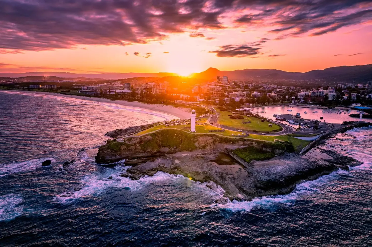 Last light over a coastal settlement
